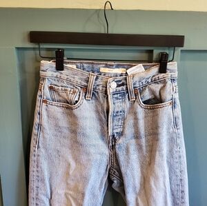 Levi's wedgie light wash raw hem straight leg jean